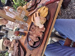 Exclusive dining experience at Finca de Rigo in Guatapé, Colombia featuring premium steak and private culinary service.